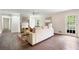 Bright living room features hardwood floors, fireplace, and access to backyard patio at 3131 Garden Lane Dr, Marietta, GA 30062