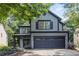 Charming two-story home with a two-car garage, beautifully landscaped front yard, and covered porch at 930 Silver Lake Dr, Acworth, GA 30102