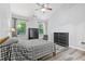 Spacious main bedroom with a ceiling fan, lots of natural light, and neutral décor at 930 Silver Lake Dr, Acworth, GA 30102