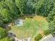 Community basketball court surrounded by trees and green space at 11575 Wildwood Springs Dr, Roswell, GA 30075