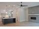 Open concept kitchen flowing into living area with modern island and stylish fireplace at 293 White St # 2, Marietta, GA 30060