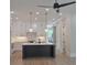 Bright, modern kitchen with a center island, white cabinetry, and hardwood floors at 293 White St # 2, Marietta, GA 30060