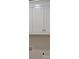 New laundry room features white cabinets and plenty of storage space at 293 White St # 2, Marietta, GA 30060