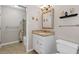 Nicely appointed bathroom featuring a vanity with granite counters and shower with tub at 297 Northgate Trce, Roswell, GA 30075