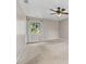 Spacious bedroom with a ceiling fan and a large window bringing in natural light at 297 Northgate Trce, Roswell, GA 30075
