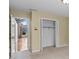 Bright bedroom features a closet and doorway to a living room with hardwood floors at 297 Northgate Trce, Roswell, GA 30075