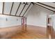 Huge living room with vaulted ceiling, wood beams, hardwood floors, and lots of space at 297 Northgate Trce, Roswell, GA 30075