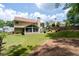 Spacious backyard with a well-maintained lawn and privacy fence at 516 Huntgate Rd, Woodstock, GA 30189