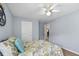 Comfortable bedroom with a ceiling fan and neutral carpet at 516 Huntgate Rd, Woodstock, GA 30189