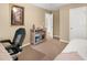 Bedroom features a daybed, a ceiling fan, and neutral decor at 516 Huntgate Rd, Woodstock, GA 30189