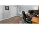 A functional office area with space for multiple monitors and storage featuring neutral tones at 516 Huntgate Rd, Woodstock, GA 30189