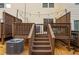 Backyard featuring a deck with stairs, rock landscaping, and exterior lighting at 1304 Liberty Nw Pkwy # 1610, Atlanta, GA 30318