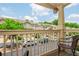 Neighborhood view from the cozy balcony with a chair, providing a relaxing outdoor space and natural light at 1304 Liberty Nw Pkwy # 1610, Atlanta, GA 30318