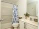 Clean bathroom featuring a tub and shower, vanity and a full sized mirror at 1304 Liberty Nw Pkwy # 1610, Atlanta, GA 30318
