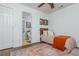 Cozy bedroom with ceiling fan, natural light, ensuite bathroom, bed, and colorful area rug at 1304 Liberty Nw Pkwy # 1610, Atlanta, GA 30318