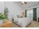 Comfortable bedroom with a plush bed, stylish decor, and lots of natural light at 1304 Liberty Nw Pkwy # 1610, Atlanta, GA 30318
