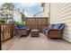 Relaxing deck with outdoor seating and privacy fencing at 1304 Liberty Nw Pkwy # 1610, Atlanta, GA 30318