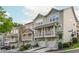 Inviting townhomes with garage parking, charming porches, and vibrant landscaping, creating a welcoming neighborhood atmosphere at 1304 Liberty Nw Pkwy # 1610, Atlanta, GA 30318