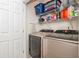 Functional laundry room with modern appliances and ample storage space at 1304 Liberty Nw Pkwy # 1610, Atlanta, GA 30318