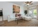 Bright living room with a comfortable sofa, stylish decor, and access to a private balcony at 1304 Liberty Nw Pkwy # 1610, Atlanta, GA 30318
