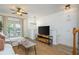 Cozy living room featuring natural light, a neutral sofa, and a stylish console table at 1304 Liberty Nw Pkwy # 1610, Atlanta, GA 30318
