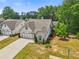 Aerial shot of a well-manicured home showcasing its well-kept landscaping and charming facade at 2335 Plummer Sw Pl, Marietta, GA 30064