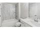 Stylish bathroom featuring marble accents, and modern fixtures at 2335 Plummer Sw Pl, Marietta, GA 30064