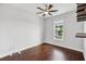 Bedroom with hardwood floors, neutral paint, ceiling fan and natural light at 2335 Plummer Sw Pl, Marietta, GA 30064