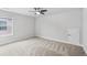 Large bedroom with soft carpeting and lots of natural light at 2335 Plummer Sw Pl, Marietta, GA 30064