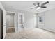 Bright bedroom with connecting bathroom and window at 2335 Plummer Sw Pl, Marietta, GA 30064
