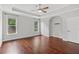 Open bedroom showcasing tray ceiling, recessed lights, and hardwood flooring at 2335 Plummer Sw Pl, Marietta, GA 30064