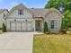 Charming single-Gathering home featuring a two-car garage and well-manicured front lawn at 2335 Plummer Sw Pl, Marietta, GA 30064