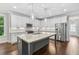 Modern kitchen with stainless steel appliances, an island, and ample cabinet space at 2335 Plummer Sw Pl, Marietta, GA 30064