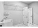 Functional laundry area equipped with sink, storage, and bright lighting at 2335 Plummer Sw Pl, Marietta, GA 30064