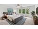 Beautifully staged main bedroom with abundant natural light and serene decor at 2335 Plummer Sw Pl, Marietta, GA 30064