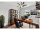Home office with hardwood floors, a ceiling fan, and a window with natural light at 2335 Plummer Sw Pl, Marietta, GA 30064