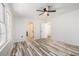 Bright bedroom boasts beautiful flooring and ample natural light from the many windows at 2674 Skylane Dr, Marietta, GA 30062