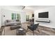 The spacious living room has abundant natural light and modern decor at 2674 Skylane Dr, Marietta, GA 30062