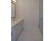 Contemporary bathroom featuring double sink vanity, modern lighting, and glass shower at 289 White St # 3, Marietta, GA 30060