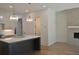 Bright kitchen showcasing a large island, modern lighting, and stainless steel appliances at 289 White St # 3, Marietta, GA 30060