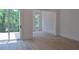 Spacious living room boasting a view of the deck and a modern chandelier at 289 White St # 3, Marietta, GA 30060