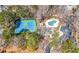 Community with tennis courts and pool surrounded by lush greenery and ample parking at 3819 Trotters Run, Douglasville, GA 30135