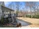 View of backyard with stairs leading to a covered porch at 3819 Trotters Run, Douglasville, GA 30135
