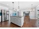 Modern kitchen with a central island, stainless appliances, and open layout at 3819 Trotters Run, Douglasville, GA 30135