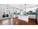 Bright kitchen with white cabinetry, granite countertops, and stainless steel appliances at 3819 Trotters Run, Douglasville, GA 30135