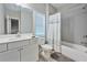 Bathroom with a single sink vanity and a tub with a shower at 4202 Morrison Way # 9, Atlanta, GA 30341