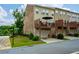 Townhome exterior with wooden porches and garages with well manicured lawns and garden areas at 4202 Morrison Way # 9, Atlanta, GA 30341