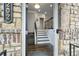 Welcoming home foyer with staircase and hardwood floors at 4202 Morrison Way # 9, Atlanta, GA 30341