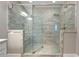 Glass enclosed shower with double shower heads, and a built in bench at 4202 Morrison Way # 9, Atlanta, GA 30341