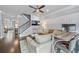 Inviting living room with a ceiling fan, staircase, TV, and access to additional rooms at 4202 Morrison Way # 9, Atlanta, GA 30341